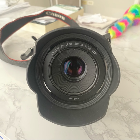 Canon EOS M6 - with 50mm lens and three batteries included.